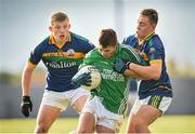 26 November 2014; Shane O'Connor, Coláiste Na Sceilge, in action against Dara Moynihan, right, and Evan Cronin, left, St. Brendan's. Corn Ui Mhuiri, Round 3, St. Brendan's, Killarney, v Coláiste Na Sceilge, Cahersiveen. Cromane, Co. Kerry. Picture credit: Stephen McCarthy / SPORTSFILE
