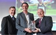 26 November 2014; Thomas Barr receives the Inspirational Perfomance on Irish Soil award from Ciaran O'Cathain, President of Athletics Ireland, left, and Minister of State for Tourism and Sport Michael Ring T.D, at the National Athletics Awards. Crowne Plaza Hotel, Santry, Co. Dublin. Picture credit: Barry Cregg / SPORTSFILE