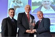 26 November 2014; Phil Conway receives the Lifetime Achievement award from Ciaran O'Cathain, President of Athletics Ireland, left, and Minister of State for Tourism and Sport Michael Ring T.D, at the National Athletics Awards. Crowne Plaza Hotel, Santry, Co. Dublin. Picture credit: Barry Cregg / SPORTSFILE
