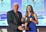 26 November 2014; Allanah Lally, Presentation College Athenry, receives the Schools Girl Athelete of the Year award from Michael Hunt, President of the Irish Schools' Athletics Association, during the National Athletics Awards. Crowne Plaza Hotel, Santry, Co. Dublin. Picture credit: Barry Cregg / SPORTSFILE