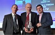 26 November 2014; Brian Lynch receives the Master Runner of the Year award from Michael Fennell, left, and John Foley, CEO of Athletics Ireland, during the National Athletics Awards. Crowne Plaza Hotel, Santry, Co. Dublin. Picture credit: Barry Cregg / SPORTSFILE