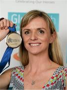 26 November 2014; Roisin McGettigan, with her European Indoors 1500m Bronze medal which she won in Turin in 2009, during the National Athletics Awards. Crowne Plaza Hotel, Santry, Co. Dublin. Picture credit: Barry Cregg / SPORTSFILE
