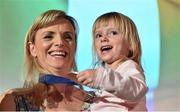 26 November 2014; Roisin McGettigan, with her daughter Hope, aged 3, after she received her European Indoors 1500m Bronze medal which she won in Turin in 2009, during the National Athletics Awards. Crowne Plaza Hotel, Santry, Co. Dublin. Picture credit: Barry Cregg / SPORTSFILE