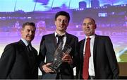 26 November 2014; Mark English receives the Athlete of the Year award from Jim Dowdall, left, CEO of GloHealth, and Ciaran O'Cathain, President of Athletics Ireland, at the National Athletics Awards. Crowne Plaza Hotel, Santry, Co. Dublin. Picture credit: Barry Cregg / SPORTSFILE