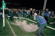 15 February 1995; Stewards remove the goalposts after rioting in the Upper West Stand caused the game to be abandoned. International Friendly, Republic of Ireland v England, Lansdowne Road, Dublin. Picture credit; David Maher / SPORTSFILE
