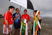 17 July 2007; Dublin footballers Jason Sherlock, right, and Ciaran Whelan, Cork hurler Tom Kenny, left, and Cork footballer James Masters, were announced as Ariel GAA Championship Bright Ambassadors for 2007. This summer, Ariel is giving away free exclusive GAA towels with promotional packs. Martello Tower, Sandymount Strand, Dublin. Picture credit: Ray McManus / SPORTSFILE