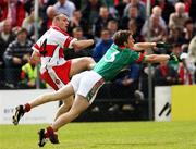 14 July 2007; Paddy Bradley, Derry, in action against Liam O'Malley, Mayo. Bank of Ireland All-Ireland Football Championship Qualifier, Round 2, Derry v Mayo, Celtic Park, Derry. Picture credit: Oliver McVeigh / SPORTSFILE