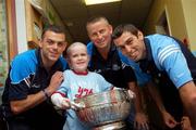 19 July 2007; Dublin players, Paul Casey, left, David Henry, right, and manager Paul Caffrey, with Nathan Roche-Whelan, age 7, from Tramore , Co. Waterford, on a visit to Our Lady's Children's Hospital, Crumlin, Dublin. Picture credit: Stephen McCarthy / SPORTSFILE