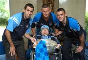 19 July 2007; Dublin players David Henry, left, Paul Casey, right, and manager Paul Caffrey with long term patient Bernard O'Donnell, from Dublin, on a visit to Our Lady's Children's Hospital, Crumlin, Dublin. Picture credit: Stephen McCarthy / SPORTSFILE