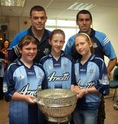 19 July 2007; Dublin players Paul Casey, left, and David Henry with Brona Coakley, age 12, left, Eimer Flynn, age 12, centre, and Grace O'Shea, age 11, all from Lucan, Co. Dublin, on a visit to Our Lady's Children's Hospital, Crumlin, Dublin. Picture credit: Stephen McCarthy / SPORTSFILE