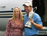 23 July 2007; The Open Championship winner Padraig Harrington with his wife Caroline and the Golf Champion Trophy (Claret Jug) on his arrival home at Weston airport, Leixlip, Co. Kildare. Picture credit: Pat Murphy / SPORTSFILE