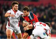28 November 2014; Pat Howard, Munster, is tackled by Stuart McCloskey, left, and Darren Cave, right, Ulster. Guinness PRO12, Round 9, Munster v Ulster. Thomond Park, Limerick. Picture credit: Stephen McCarthy / SPORTSFILE