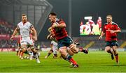 28 November 2014; Robin Copeland, Munster, goes over for his side's first try despite the tackle of Stuart Olding, Ulster. Guinness PRO12, Round 9, Munster v Ulster. Thomond Park, Limerick. Picture credit: Stephen McCarthy / SPORTSFILE
