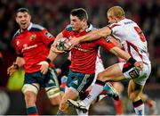 28 November 2014; Ronan O'Mahony, Munster, is tackled by Paul Marshall, Ulster. Guinness PRO12, Round 9, Munster v Ulster. Thomond Park, Limerick. Picture credit: Stephen McCarthy / SPORTSFILE