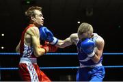 28 November 2014; Hughie Myers, Ireland, right, exchanges punches with Anthony Chapat, France, during their 49kg bout. Elite Boxing International, Ireland v France, National Stadium, Dublin. Picture credit: Ramsey Cardy / SPORTSFILE