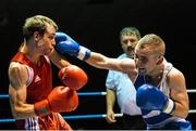 28 November 2014; Hughie Myers, Ireland, right, exchanges punches with Anthony Chapat, France, during their 49kg bout. Elite Boxing International, Ireland v France, National Stadium, Dublin. Picture credit: Ramsey Cardy / SPORTSFILE