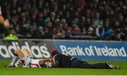 28 November 2014; Ulster's Stuart Olding receives medical attention during the first half. Guinness PRO12, Round 9, Munster v Ulster, Thomond Park, Limerick. Picture credit: Diarmuid Greene / SPORTSFILE