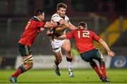 28 November 2014; Stuart McCloskey, Ulster, is tackled by Paddy Butler, left, and Denis Hurley, right, Munster. Guinness PRO12, Round 9, Munster v Ulster. Thomond Park, Limerick. Picture credit: Stephen McCarthy / SPORTSFILE