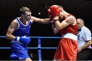 28 November 2014; Sean McComb, Ireland, left, exchanges punches with Maxime Devignaud, France, during their 60 bout. Elite Boxing International, Ireland v France, National Stadium, Dublin. Picture credit: Ramsey Cardy / SPORTSFILE