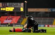 28 November 2014; Andrew Smith, Munster, is treated for an injury late in the game. Guinness PRO12, Round 9, Munster v Ulster. Thomond Park, Limerick. Picture credit: Stephen McCarthy / SPORTSFILE