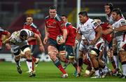 28 November 2014; Robin Copeland, Munster, gets away from Sean Reidy, left, and Nick Williams, Ulster. Guinness PRO12, Round 9, Munster v Ulster, Thomond Park, Limerick. Picture credit: Diarmuid Greene / SPORTSFILE
