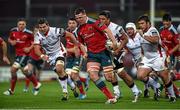28 November 2014; Robin Copeland, Munster, gets away from Sean Reidy, left, Nick Williams and Wiehahn Herbst, right, Ulster. Guinness PRO12, Round 9, Munster v Ulster, Thomond Park, Limerick. Picture credit: Diarmuid Greene / SPORTSFILE