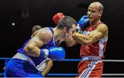28 November 2014; Darren O’Neill, Ireland, left, exchanges punches with Djibril Coupe, France, during their 91kg bout. Elite Boxing International, Ireland v France, National Stadium, Dublin. Picture credit: Ramsey Cardy / SPORTSFILE