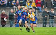 29 November 2014; Rachel Fitzmaurice, St. Ciaran's, in action against Saoirse Barry, Murroe Boher. TESCO Homegrown All Ireland Junior Club Championship Final, Murroe Boher, Limerick v St. Ciaran's, Roscommon, Ballinasloe, Co. Galway. Picture credit: Ray Ryan / SPORTSFILE