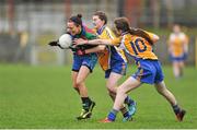 29 November 2014; Kathryn Fahey, Murroe Boher, in action against Chloe Whyte-Lennon and Aoife Beades, St. Ciaran's. TESCO Homegrown All Ireland Junior Club Championship Final, Murroe Boher, Limerick v St. Ciaran's, Roscommon, Ballinasloe, Co. Galway. Picture credit: Ray Ryan / SPORTSFILE
