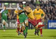 29 November 2014; John Muldoon, Connacht, is tackled by Steven Shingler, Scarlets. Guinness PRO12, Round 9, Connacht v Scarlets, The Sportsground, Galway. Picture credit: Matt Browne / SPORTSFILE