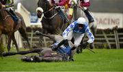 30 November 2014; Tarabiyn, unseats jockey Mikey Fogarty at the first during The Bar One Racing Juvenile 3-Y-O Hurdle. Horse Racing from Fairyhouse, Co. Meath Picture credit: Barry Cregg / SPORTSFILE