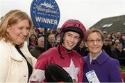 30 November 2014; Jockey Bryan Cooper with trainer Sandra Hughes and Eileen Hughes, wife and duaghter of the late Dessie Hughes in the winners enclosure after he rode their horse  Lieutenant Colonel to win The Bar One Racing Hatton`s Grace Hurdle. Horse Racing from Fairyhouse, Co. Meath Picture credit: Barry Cregg / SPORTSFILE