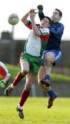 28 January 2005; Dave Fenton, Garda College, Templemore, contests a high ball with Rory O'Loan, UUC. Datapac Sigerson Cup, Preliminary Round, Garda College Templemore v University of Ulster, Coleraine, County Grounds, Drogheda, Co. Louth. Picture credit; Damien Eagers / SPORTSFILE