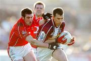 13 February 2005; Dessie Dolan, Westmeath, in action against Noel O'Laoire, Cork. Allianz National Football League, Division 1A, Westmeath v Cork, Cusack Park, Mullingar, Co. Westmeath. Picture credit; Pat Murphy / SPORTSFILE
