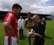 1 July 2007; Referee Marty Duffy speaks to the Kerry and Cork captains Derek Kavanagh and Declan O'Sullivan before the game. Bank of Ireland Munster Senior Football Championship Final, Kerry v Cork, Fitzgerald Stadium, Killarney, Co. Kerry. Picture credit: Ray McManus / SPORTSFILE