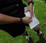 1 July 2007; Referee Marty Duffy checks the team sheets before the game. Bank of Ireland Munster Senior Football Championship Final, Kerry v Cork, Fitzgerald Stadium, Killarney, Co. Kerry. Picture credit: Ray McManus / SPORTSFILE