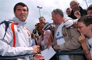 27 July 2007; Sunderland manager Roy Keane signs autographs prior to training ahead of tomorrow's friendly with Bohemians in Dalymount Park. Malahide United AFC, Gannon Park, Coast Road, Malahide, Co. Dublin. Picture credit: Brian Lawless / SPORTSFILE