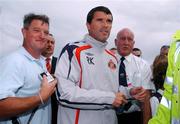 27 July 2007; Sunderland manager Roy Keane makes his way through fans to training ahead of tomorrow's friendly with Bohemians in Dalymount Park. Malahide United AFC, Gannon Park, Coast Road, Malahide, Co. Dublin. Picture credit: Brian Lawless / SPORTSFILE