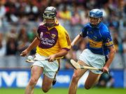 28 July 2007; Darren Stamp, Wexford, in action against Hugh Maloney, Tipperary. Guinness All-Ireland Senior Hurling Championship Quarter-Final, Wexford v Tipperary, Croke Park, Dublin. Picture credit; Ray McManus / SPORTSFILE