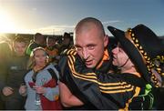 30 November 2014; Kieran Donaghy, Austin Stacks, is embraced by a supporter as they celebrate their side's victory after the game. AIB Munster GAA Football Senior Club Championship Final, Austin Stacks v The Nire, Páirc Ui Chaoimh, Cork.