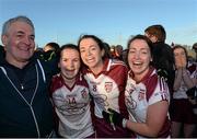 30 November 2014; Termon team-mates and sisters from left Geraldine McLaughlin, Sharon McLaughlin, Nicole McLaughlin, celebrate with their father after the final whistle. TESCO HomeGrown All-Ireland Senior Club Championship Final, Termon, Donegal v Mourneabbey, Cork, Tuam Stadium, Tuam, Co. Galway. Picture credit: Matt Browne / SPORTSFILE