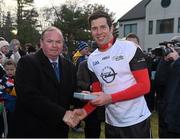 29 November 2014; Sean Cavanagh, Tyrone, 2013 All Stars, is presented with a medal after the game by Uachtarán Chumann Lúthchleas Gael Liam Ó Néill. GAA GPA All Star Tour 2014, sponsored by Opel, 2013 All Stars v 2014 All Stars. Irish Cultural Centre, New Boston Dr, Canton, Massachusetts, USA. Picture credit: Ray McManus / SPORTSFILE