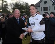 29 November 2014; Conor McManus, Monaghan, 2013 All Stars, is presented with a medal after the game by Uachtarán Chumann Lúthchleas Gael Liam Ó Néill. GAA GPA All Star Tour 2014, sponsored by Opel, 2013 All Stars v 2014 All Stars. Irish Cultural Centre, New Boston Dr, Canton, Massachusetts, USA. Picture credit: Ray McManus / SPORTSFILE