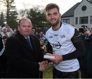 29 November 2014; Aidan O'Shea, Mayo, 2013 All Stars, is presented with a medal after the game by Uachtarán Chumann Lúthchleas Gael Liam Ó Néill. GAA GPA All Star Tour 2014, sponsored by Opel, 2013 All Stars v 2014 All Stars. Irish Cultural Centre, New Boston Dr, Canton, Massachusetts, USA. Picture credit: Ray McManus / SPORTSFILE