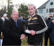 29 November 2014; Neil Gallagher, Donegal, 2014 All Stars, is presented with a medal after the game by Uachtarán Chumann Lúthchleas Gael Liam Ó Néill. GAA GPA All Star Tour 2014, sponsored by Opel, 2013 All Stars v 2014 All Stars. Irish Cultural Centre, New Boston Dr, Canton, Massachusetts, USA. Picture credit: Ray McManus / SPORTSFILE