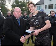 29 November 2014; David Moran, Kerry, 2014 All Stars, is presented with a medal after the game by Uachtarán Chumann Lúthchleas Gael Liam Ó Néill. GAA GPA All Star Tour 2014, sponsored by Opel, 2013 All Stars v 2014 All Stars. Irish Cultural Centre, New Boston Dr, Canton, Massachusetts, USA. Picture credit: Ray McManus / SPORTSFILE