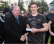 29 November 2014; Shane Walsh, Galway, 2014 All Stars, is presented with a medal after the game by Uachtarán Chumann Lúthchleas Gael Liam Ó Néill. GAA GPA All Star Tour 2014, sponsored by Opel, 2013 All Stars v 2014 All Stars. Irish Cultural Centre, New Boston Dr, Canton, Massachusetts, USA. Picture credit: Ray McManus / SPORTSFILE