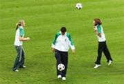 24 July 2007; Members of the Ireland soccer teams Yvonne McMonigle, left, and Nikita Burke, right, show off their heading skill while Kieran Harte practices his ball control at the announcement of the Irish Team who will be competing in the World University Games. The 24th Universiade will take place in Bangkok, Thailand from August 7th - 18th, and Ireland will have approximately a 76 strong team competing in seven sports - Football, Golf, Tennis, Taekwando, Swimming, Fencing and Athletics. Pavillion Bar, Trinity College, Dublin. Picture credit: Pat Murphy / SPORTSFILE
