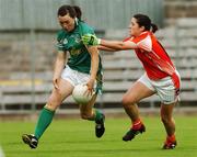 28 July 2007; Jane Burke, Meath, in action against Aileen Matthews, Armagh. TG4 All-Ireland Ladies Football Championship Group 3, Armagh v Meath, St Tighearnach's Park, Clones, Co. Monaghan. Picture credit: Matt Browne / SPORTSFILE