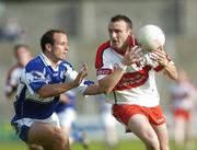 28 July 2007; Patrick Bradley, Derry, in action against Tom Kelly, Laois, Bank of Ireland All-Ireland Senior Football Championship Qualifier, Round 3, Laois v Derry, Kingspan Breffni Park, Cavan. Picture credit: Ray Lohan / SPORTSFILE
